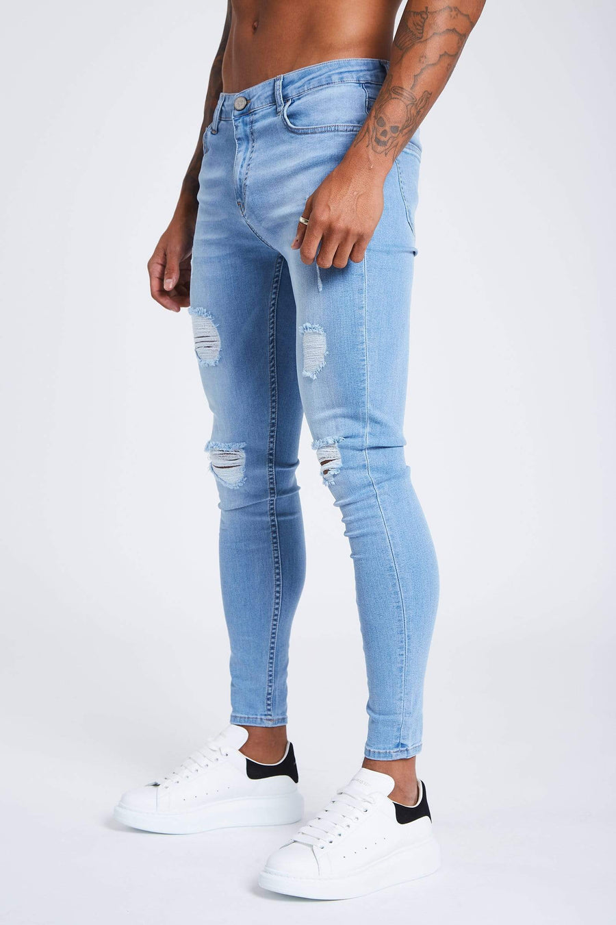 Light Blue Jeans - Ripped & Repaired
